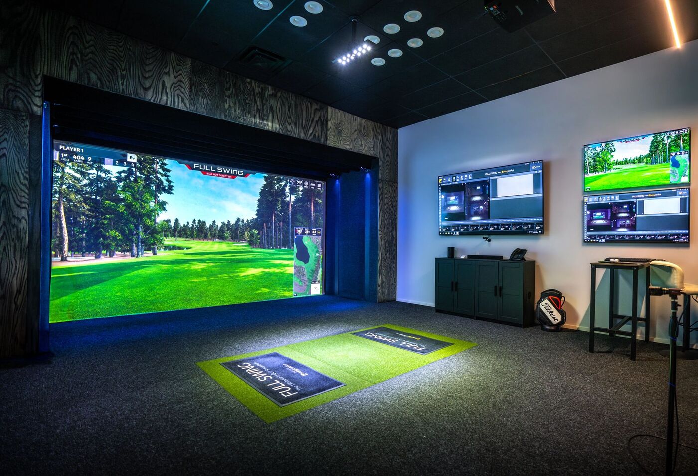 Temporary section image direction: replace with The Golf Station team working in the fitting space without making Tim the hero